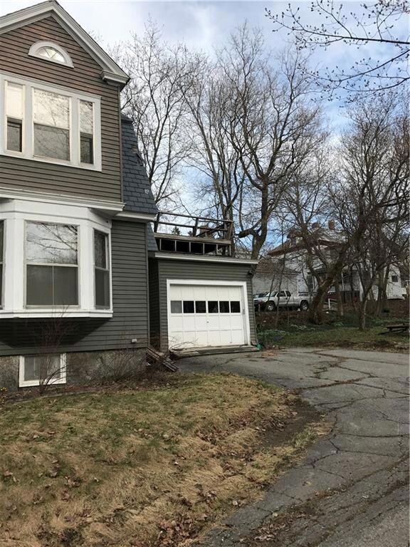 One car garage, note deck over garage.