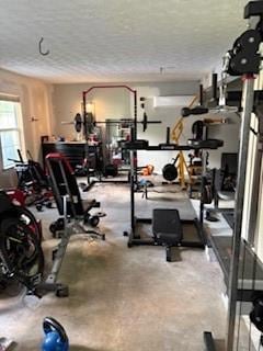 Workout area with a textured ceiling