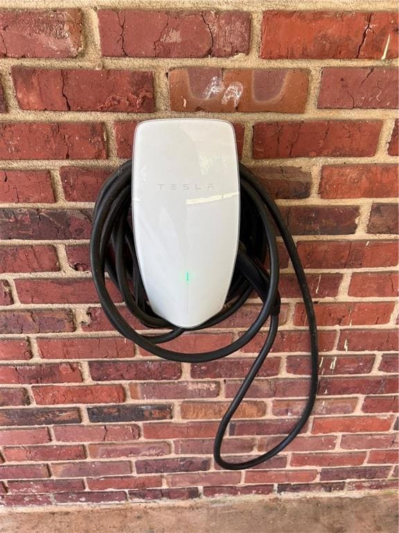 Detailed view of brick siding and car charger