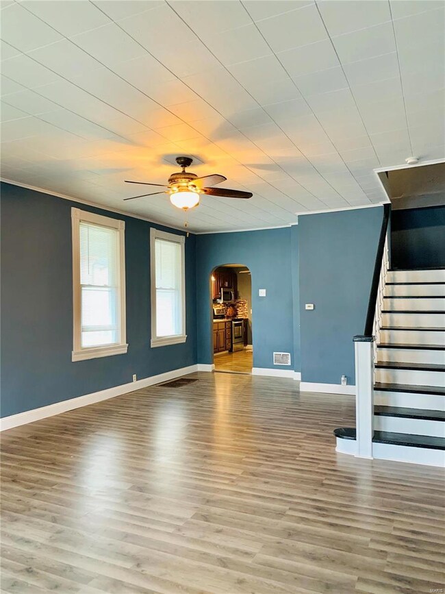 Open concept living room - dining room combo with a nice coat closet.
