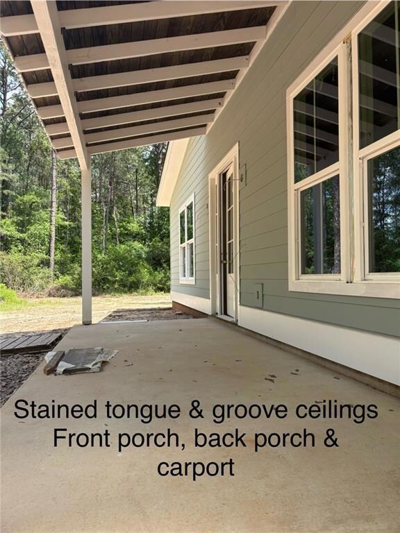 Stained tongue & groove ceilings on front porch, b