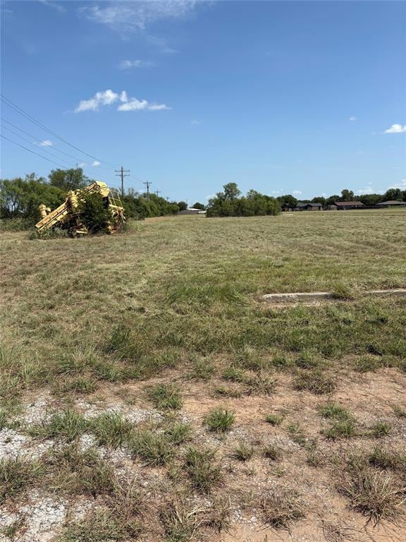 View of yard with a view of countryside