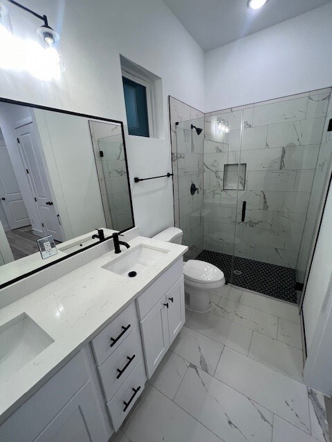Primary bath with double sinks and standalone show