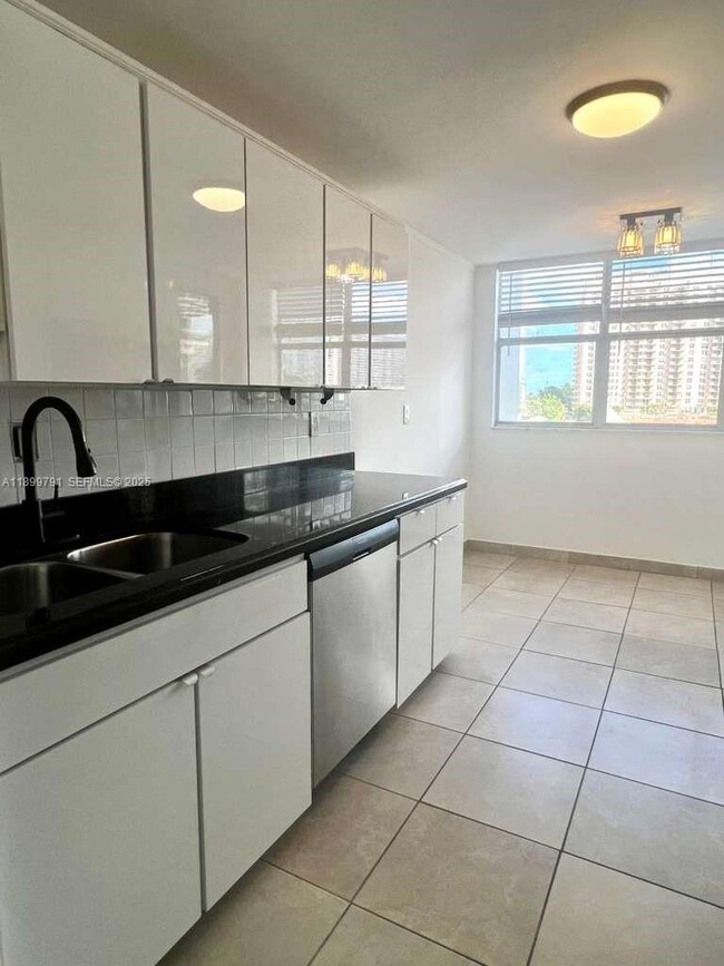 100 Golden Isles Dr unit 406, Hallandale Beach, FL 33009 - photo 5