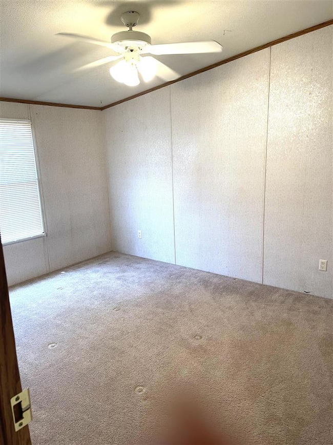 Two secondary bedrooms on west side of home with f