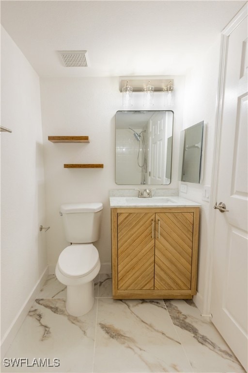 Full bath with toilet, visible vents, vanity, base