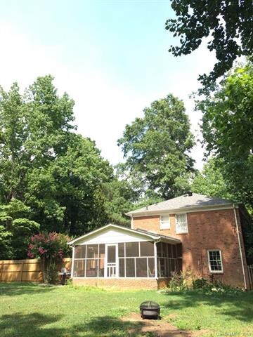 Relax on this fabulous screened 3 season porch ove