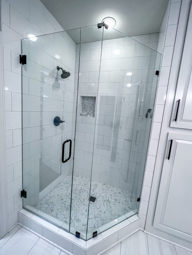 Amazing frameless glass shower.