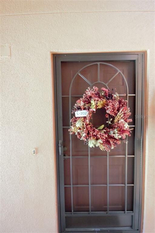 Pretty front door entry, with screened door added 