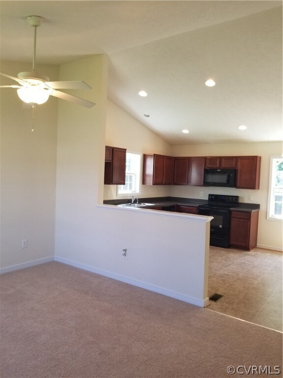 Family Room is vaulted and open to kitchen.  New C