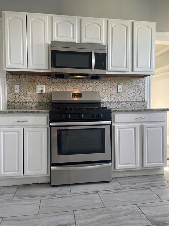 31 Woolson St unit 3, Mattapan, MA 02126 - photo 3