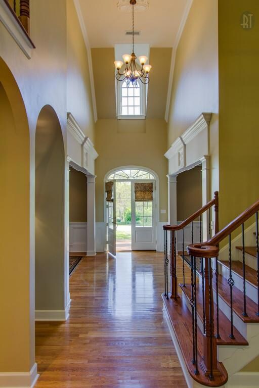 Approximately 20' ceiling in the foyer