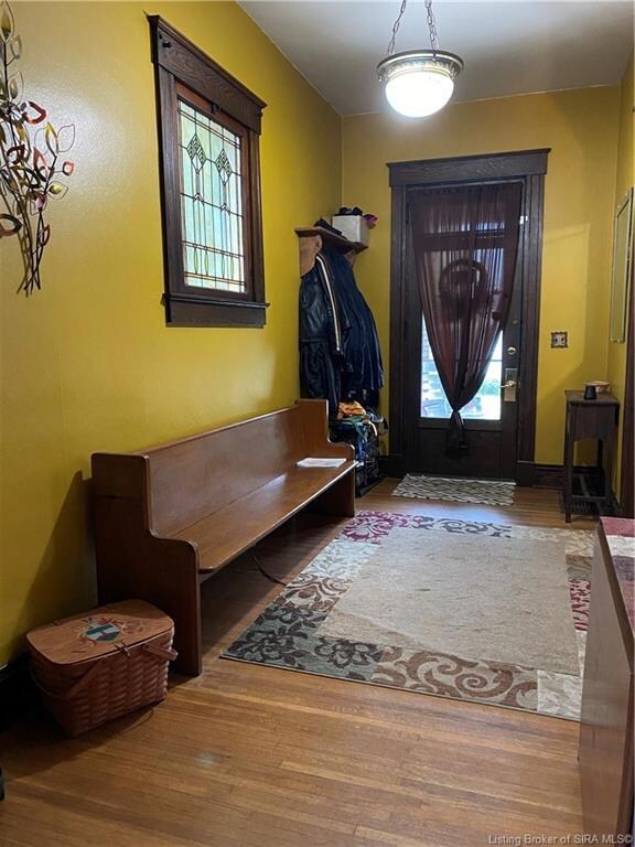 Looking back to the front door in the foyer