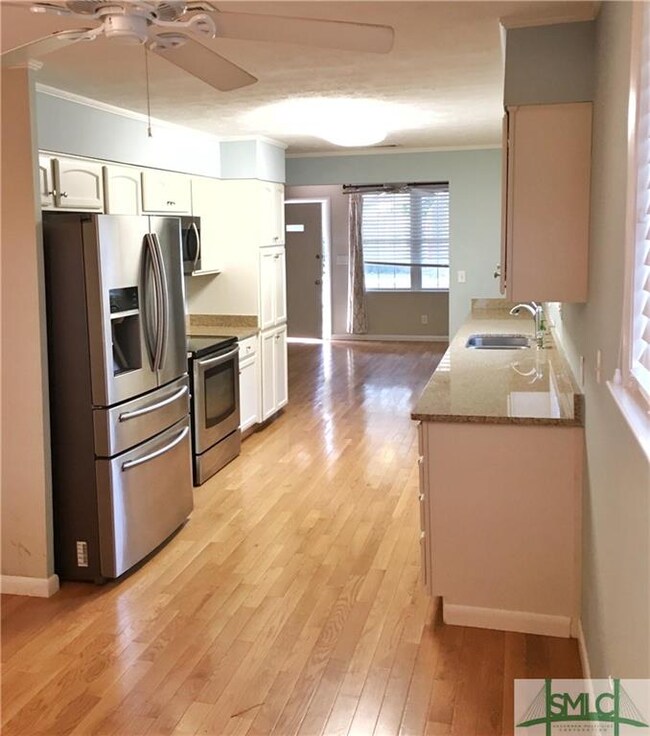 Large upgraded kitchen with granite and stainless 