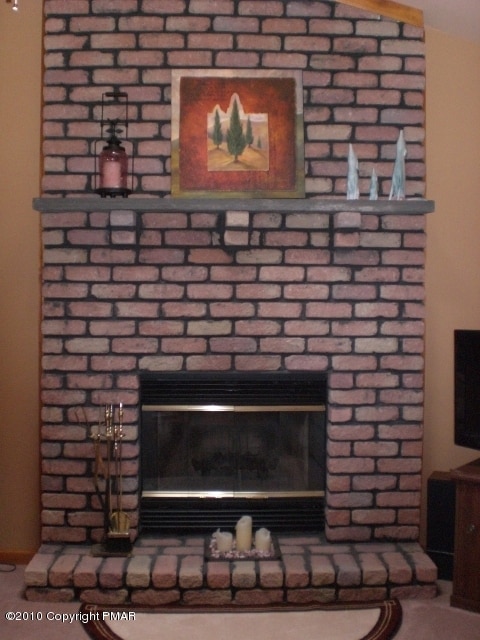 Brick woodburning fireplace