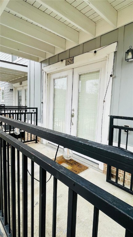 Wooden deck featuring an exterior structure
