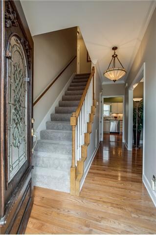 Gleaming hardwoods at the front door and throughout the main floor.