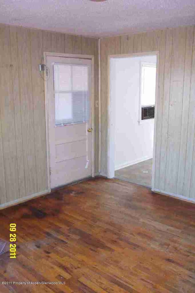 living to kitchen, front door