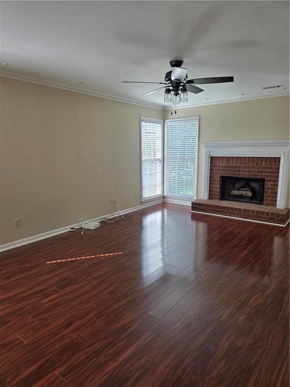 Entryway with a chandelier, wood finished floors, a textured ceiling, and ornamental molding