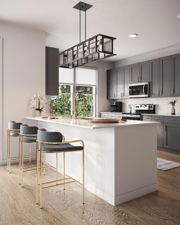 Kitchen featuring stainless steel appliances, deco