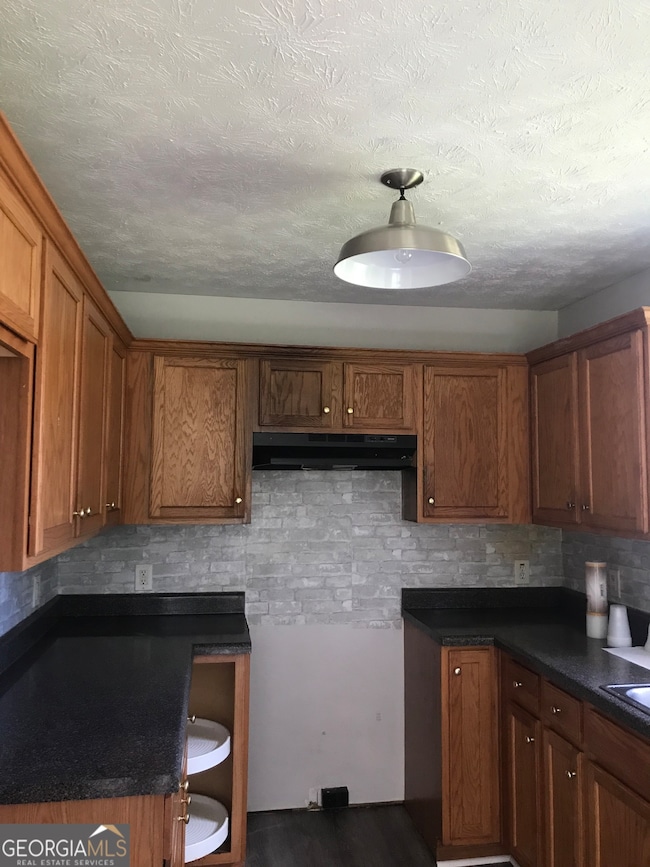 Kitchen with side sink window view