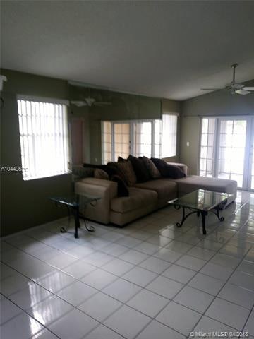 PARTIALLY FURNISHED LIVING ROOM
