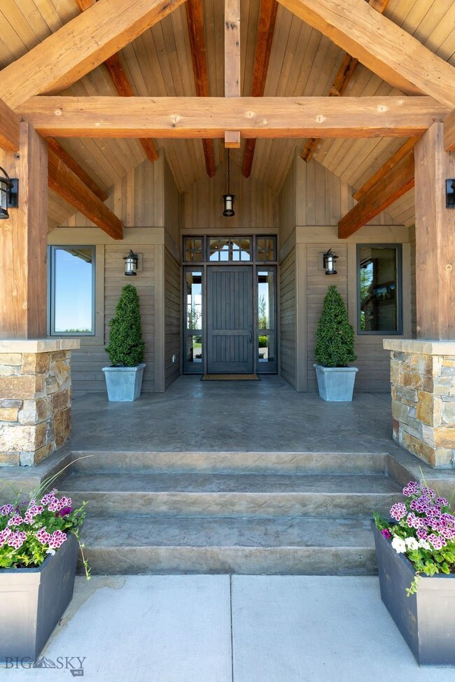Front entry with large covered porch
