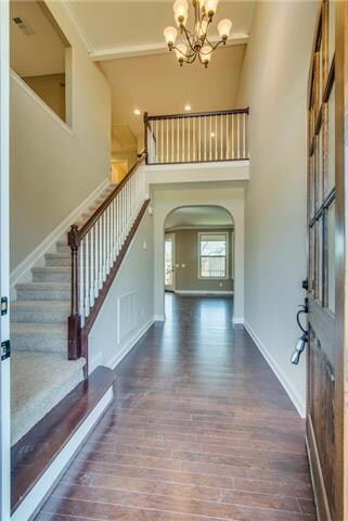 Stunning two story foyer as you walk in.