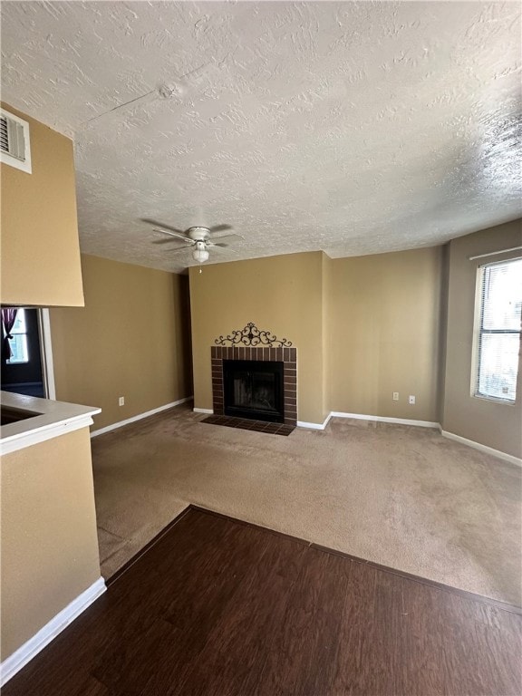 Unfurnished living room featuring baseboards, visi
