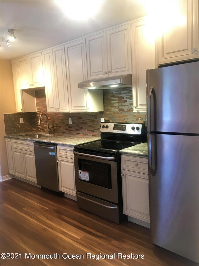 40 Meadow Green Cir unit G, Manalapan, NJ 07726 - photo 3