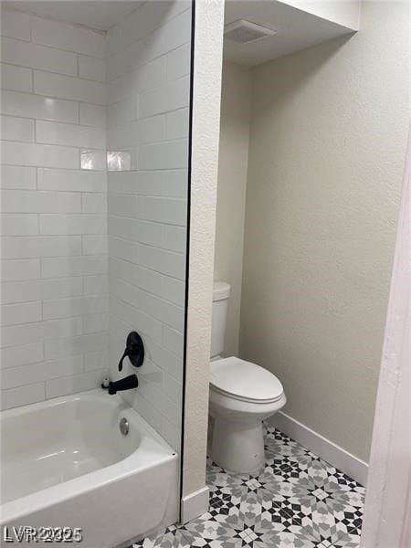 Full bathroom featuring shower / washtub combination and tile patterned floors