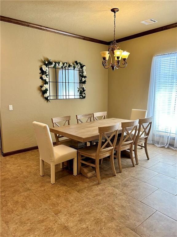 Formal dining room holds large table, would make g