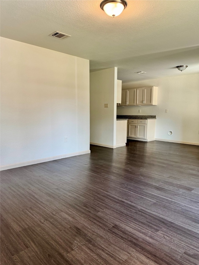 Spacious living room with semi-open plan to kitchen and dining