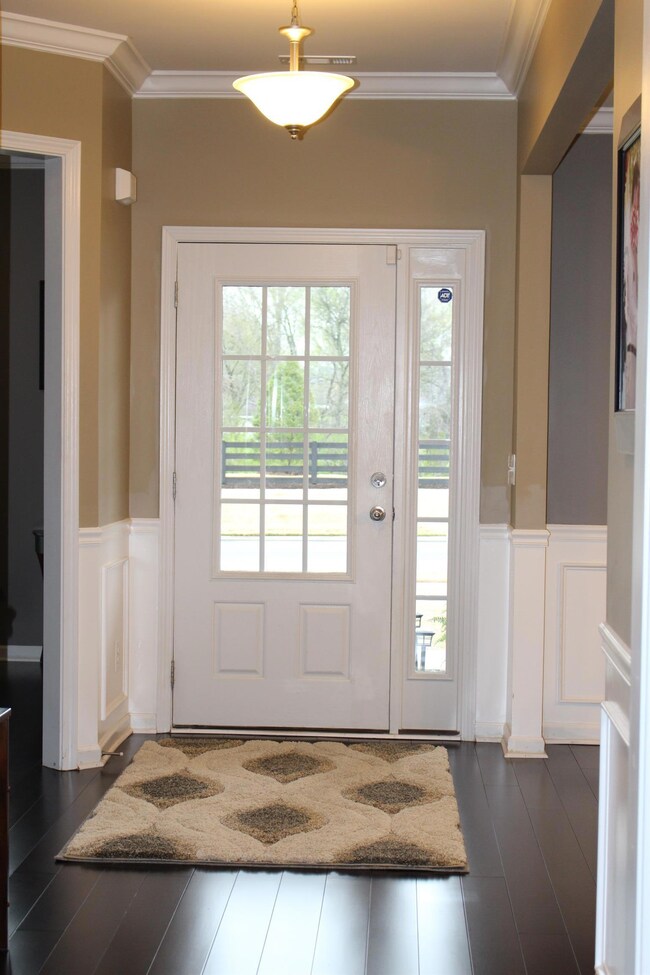 Open Foyer has lots of light. Coat Closet and additional closet provide for good storage. 