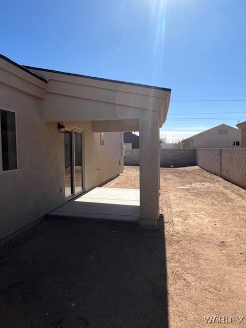 View of yard with a patio