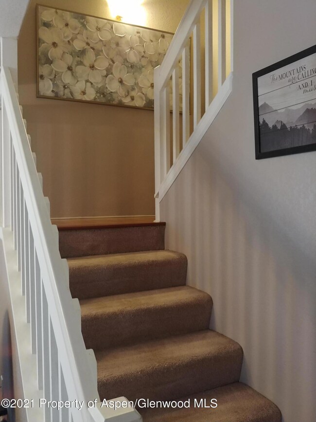 Stairs to bedrooms and laundry room