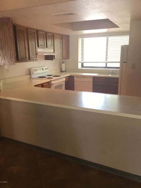 Kitchen and breakfast bar