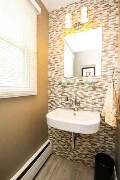 Updated main floor powder room with tiling from ce