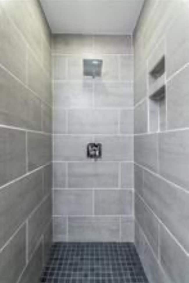 Bathroom with tiled shower