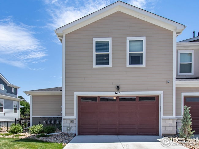 Rear Garage.  Oversized.  Pull-in and walk into your back door.
