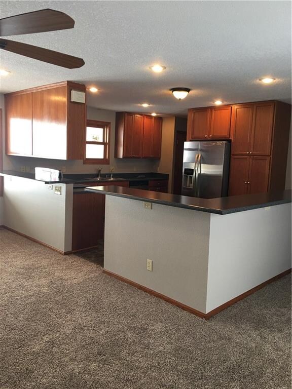 Kitchen with island that's perfect for entertainin