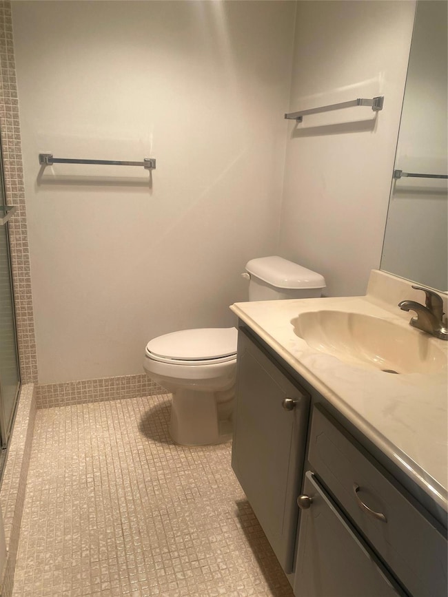 Full bathroom in hallway.