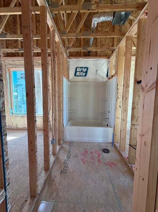 Bathroom featuring tub / shower combination