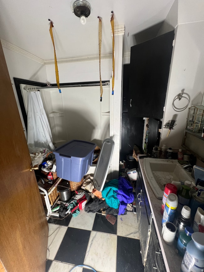 Full bathroom with vanity and toilet