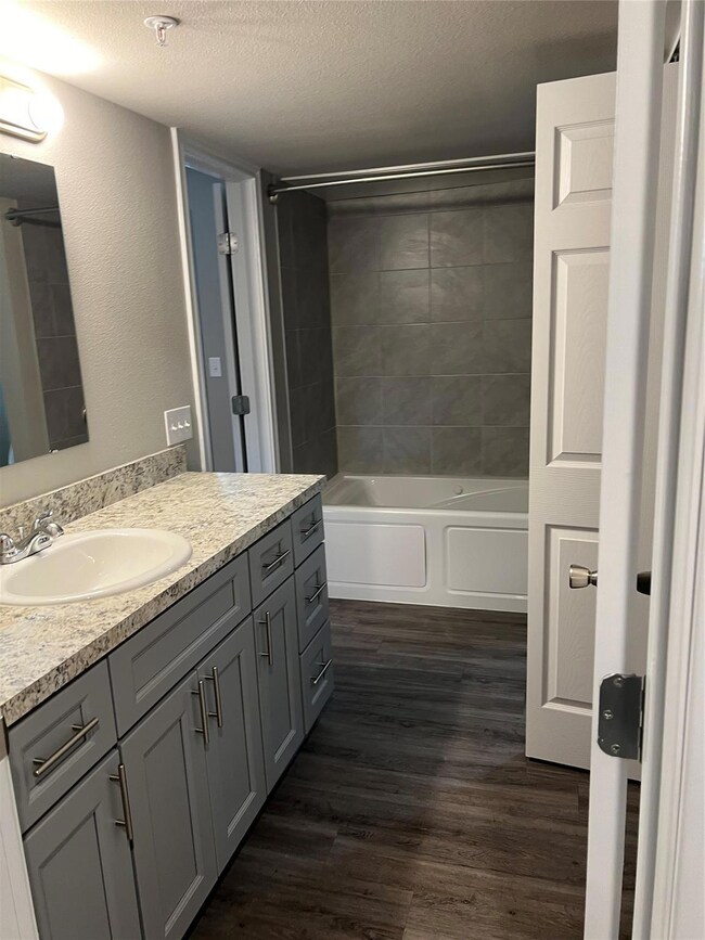 Bath with Tiled tub and shower