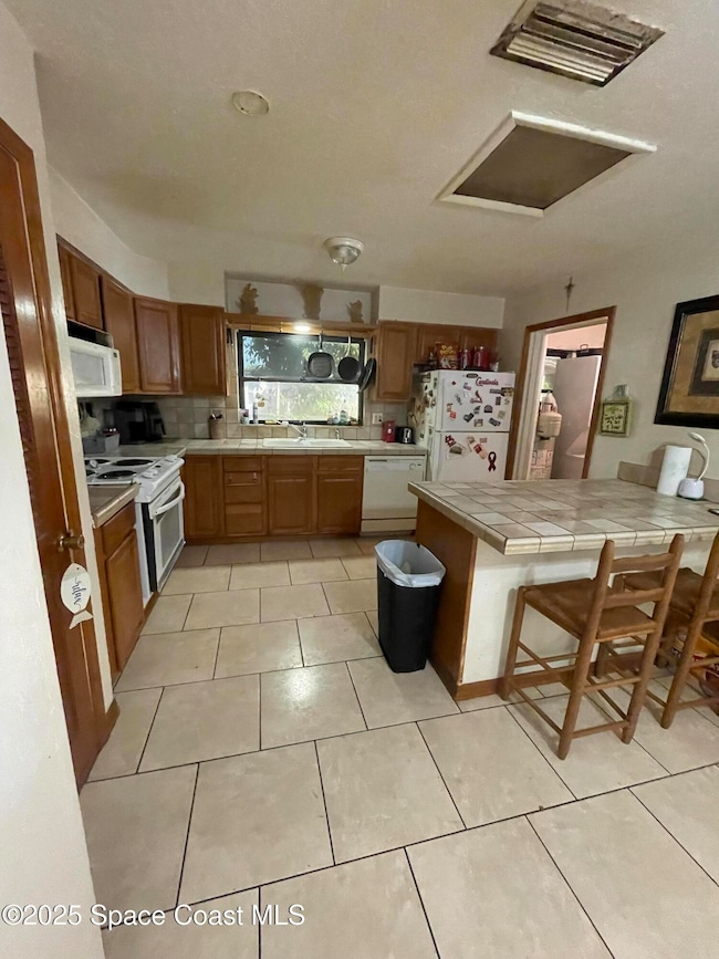 1144 N Singleton Ave, Titusville, FL 32796 - photo 5