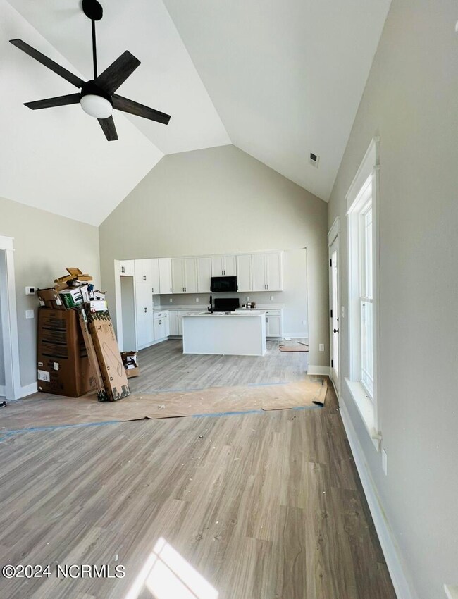 Living room w/ high ceilings