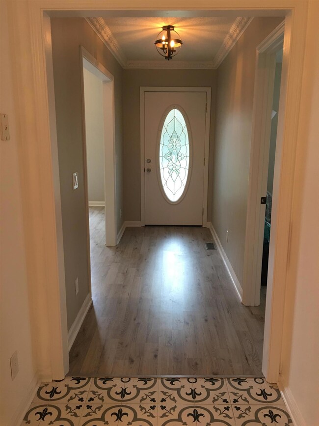 Foyer with the View of the Front Door. 