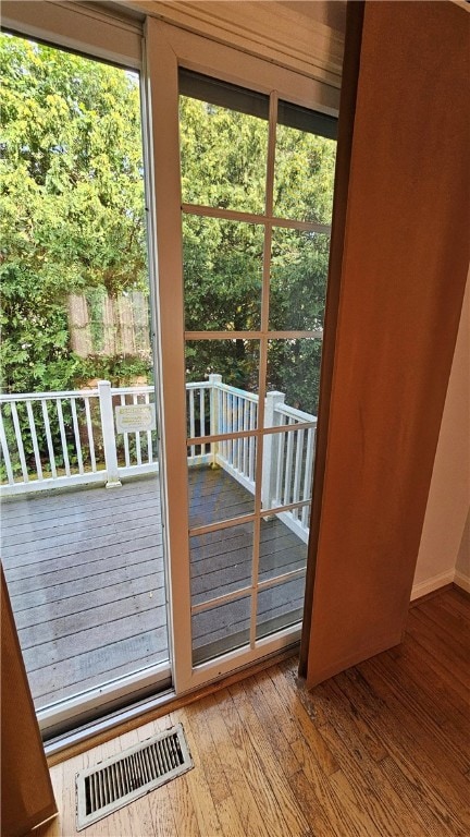 Slider door off dining room to a private deck