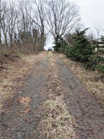 Looking back up towards Pop's discount Building Ma